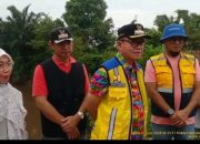 Pj Bupati Banyuasin H. Hani Syopiar Rustam Pantau Hasil Normalisasi Sungai Gasing di Perumahan Alghoni
