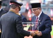 Pj. Bupati Terima Pin Emas Kapolri di Hari Bhayangkara Ke-78 Polda Sumsel