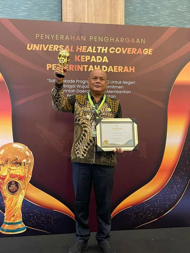 Bupati Nias Utara Meraih Penghargaan Dengan Kategori Madya Dalam Pencapaian Universal Health Coverage IMG-20240808-WA0021