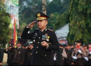 Kapolres Kampar Pimpin Upacara Pengibaran Bendera Merah Putih di HUT RI ke-79