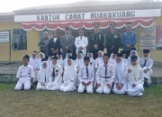 Polsek Muara Kuang Pimpin Upacara Penurunan Bendera HUT RI ke-79