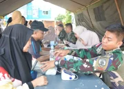 Satgas Pamtas Yonarmed 11 Kostrad Bersama Ikatan Apoteker Indonesia Gelar Pemeriksaan Kesehatan