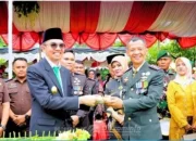 Pjs Bupati Labuhanbatu Hadiri Upacara HUT TNI Ke-79 Dilapangan Kodim 0209/LB