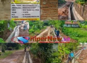 Desa Sawojajar Kotabumi Utara Bangun Drynase