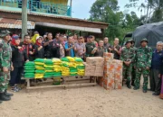 DPP TKN Kompas Nusantara Bersama KISS, Naga Karimata, dan TNI Turun Langsung Salurkan Bantuan ke Korban Banjir di Besitang