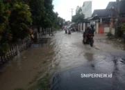 Genangan Air Sekitar 45 Cm Rendam Ruas Jalan Gang Sekolah SMAN 1 Pringsewu